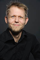 Face of Dr. Thorsten Karrer